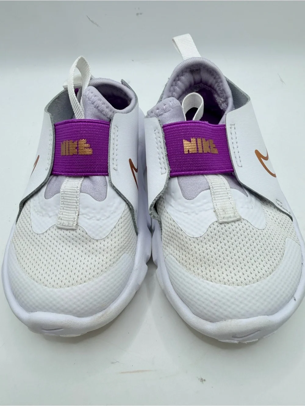 Nike Kids White Sneakers with Purple Strap and Gold Swoosh